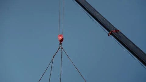 Construction crane hook lifting heavy load Stock Footage 341294370