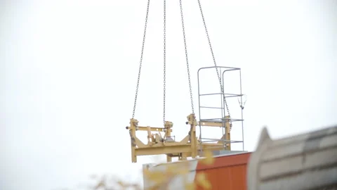 Construction crane lifting building materials Stock Footage 155033120