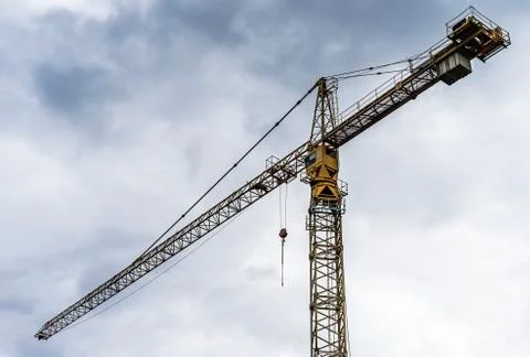 Construction crane for lifting heavy objects Stock Photos