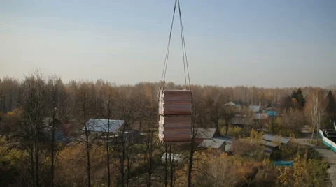 Construction crane lifts the bricks 스톡 동영상 63170635
