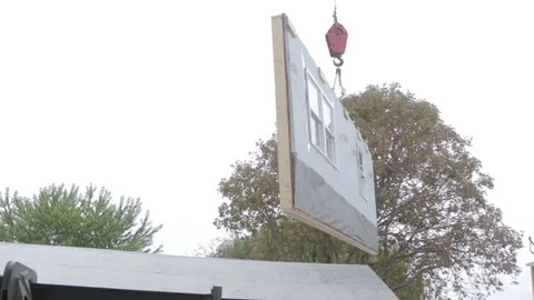 Construction Crane Lifts Wall Stock Footage 79023441