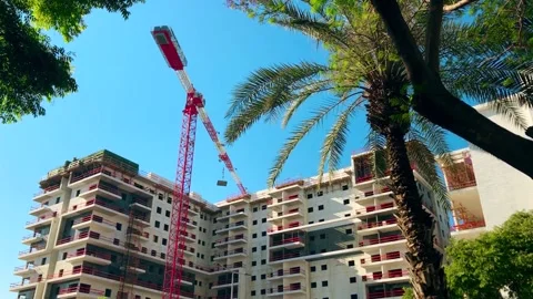 Construction crane in motion. Construction work site. ISRAEL may 2022 Stock Footage 195105672