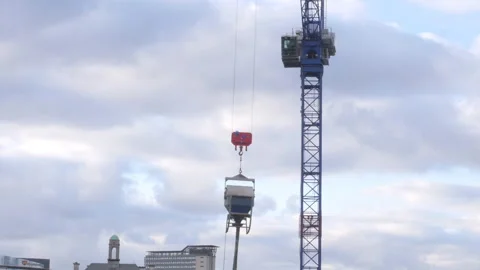Construction Crane Moving A Cement Container Stock Footage 150757459