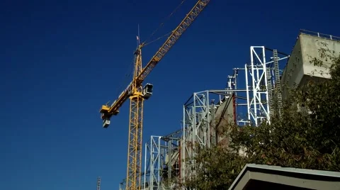 Construction crane moving construction material Video stock 44171221