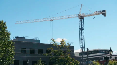 Construction Crane Moving Load. Stock Footage 67905330