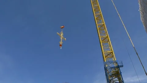 Construction crane is moving Orthodox cross. Stock Footage 197550467