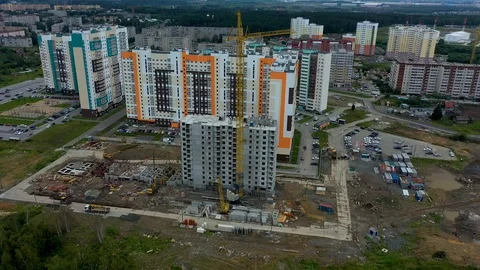 Construction crane near the building under construction. Close up of a Stock Footage 113579060