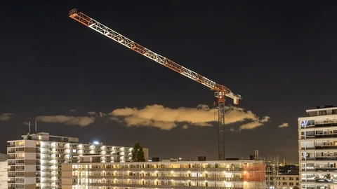 Construction crane at night Rotterdam timelapse Stock Footage 97745914