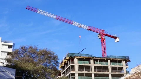 Construction Crane or construction tower moving with iron beam Stock Footage 281604498