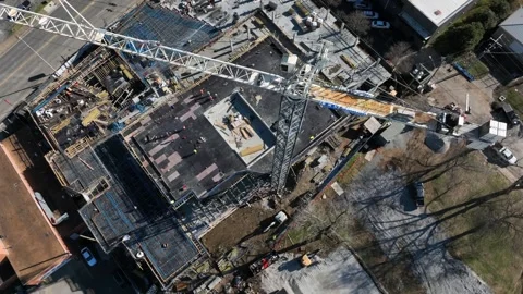 Construction crane over housing development in Nashville, showing active Stock Footage 328338312