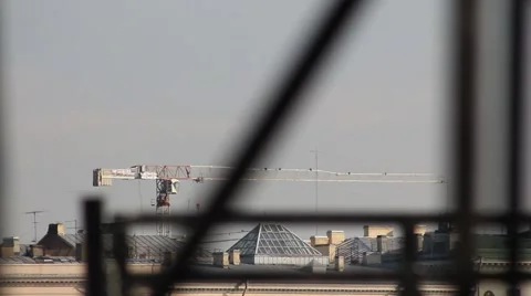 Construction crane over the rooftops Stock Footage 5165801