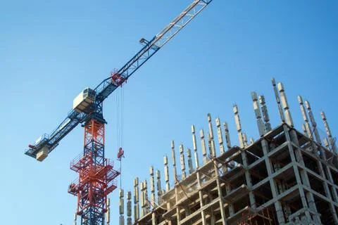 Construction crane in the process Stock Photos