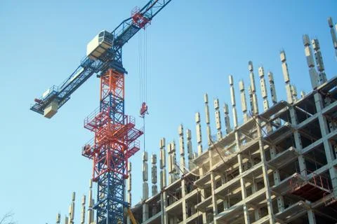 Construction crane in the process Stock Photos