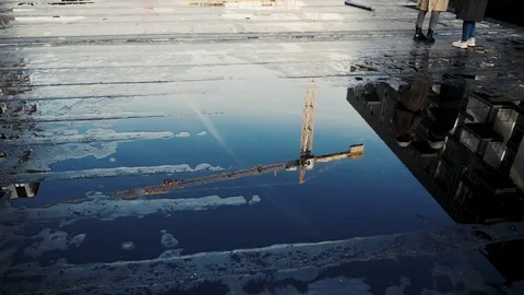 Construction crane. Reflection in the puddle Stock Footage 119984885
