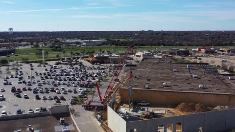 A Construction Crane Setting Wall Panel with a Window, Bryan, Texas, USA Stock Footage 129390047