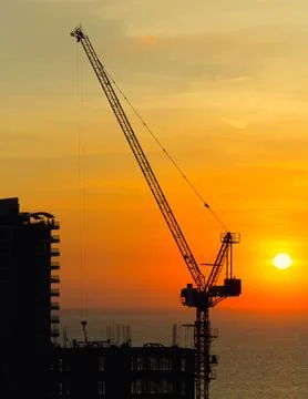 Construction Crane Silhouette Stock Photos