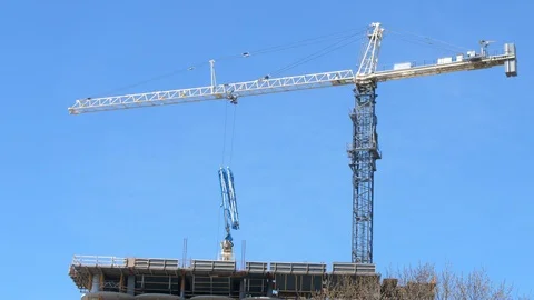 Construction crane on a sunny day Stock Footage 91038832