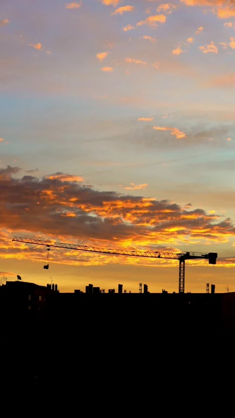 Construction crane at sunrise Stock Footage 261730789