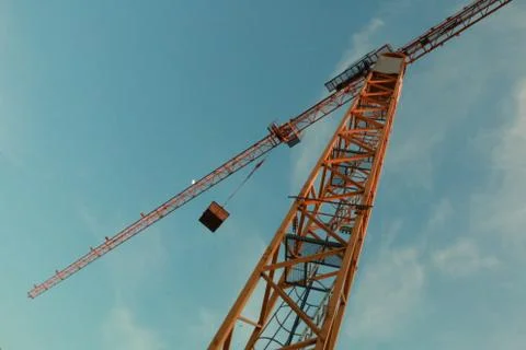 A construction crane taken from below Stock Photos