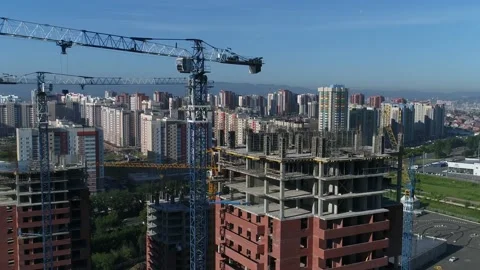 Construction crane. Tall construction crane. Building. Aerial view! Drone shot.  Stock Footage 131532196