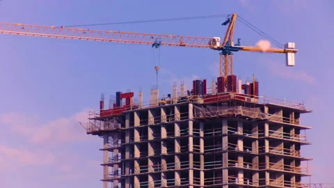 Construction crane in work mid-shot Stock Footage 142060737