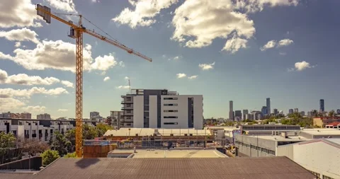 Construction crane working on a building site Stock Footage 195410500