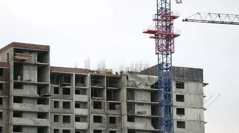 A construction crane working Stock Footage 58019423