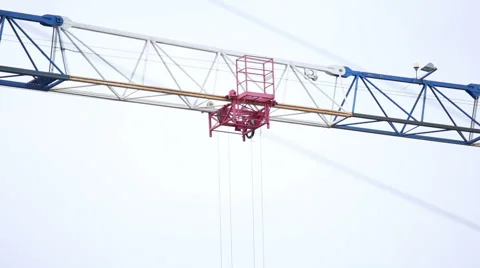 A construction crane working Stock Footage 58019561