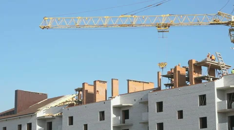 Construction crane working on a luxury object 스톡 동영상 61526132