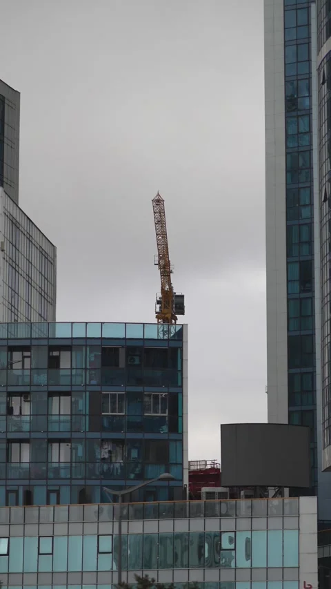 Construction crane working on skyscraper development in batumi georgia Stock Footage 333501940