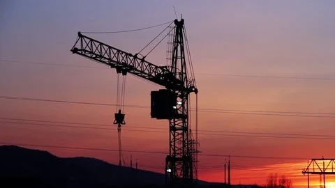 Construction Crane Working At Sunset Stock Footage 73509870