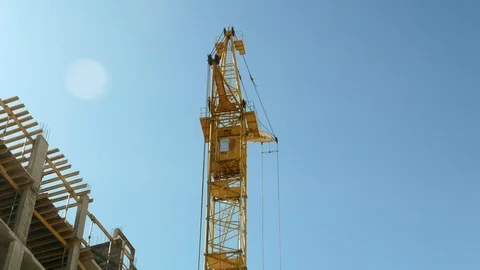 Construction crane working tower building 4k Stock Footage 89718742
