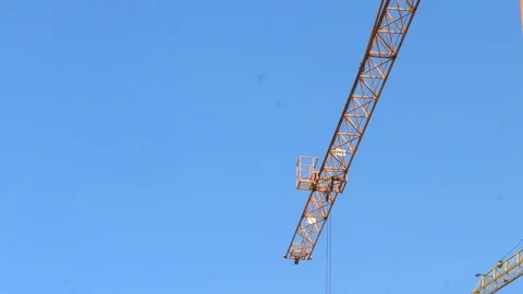 Construction crane working tower building 4k Stock-Footage 107381925
