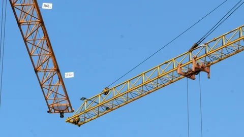 Construction crane working tower building 4k Stock-Footage 107382626