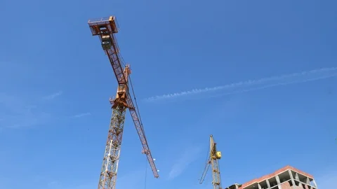 Construction crane working tower building 4k Stock-Footage 107383241