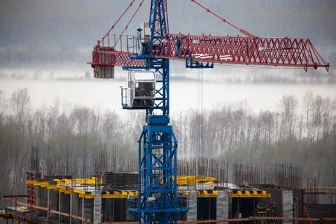 Construction crane working in winter Stock Photos