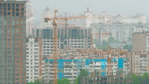 A construction crane works at a construction site Stock Footage 121166664