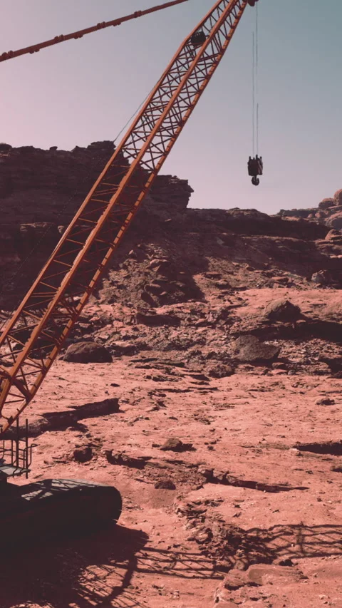 Construction crane works in dusty terrain of a construction site Stock Footage 339510096