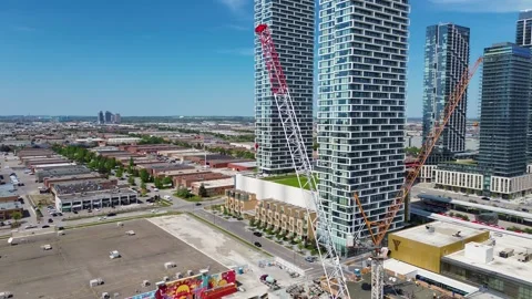 Construction Cranes and Modern Condominiums in Vaughan Metropolitan Centre Stock-Footage 335798091
