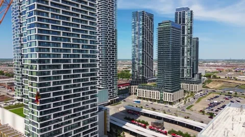 Construction Cranes and Modern Condominiums in Vaughan Metropolitan Centre Video stock 335798092