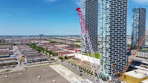 Construction Cranes and Modern Condominiums in Vaughan Metropolitan Centre 스톡 동영상 335798094