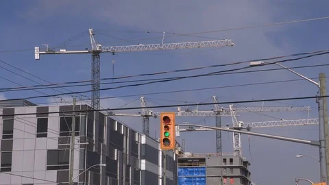 Construction cranes and urban development Stock Footage 73347302