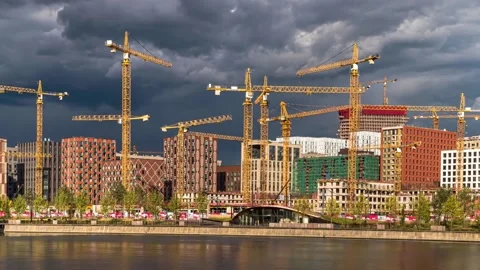 Construction cranes are working on the construction of a residential quarter  Video stock 170677086