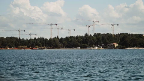 Construction cranes on the beach. Stock Footage 132299215