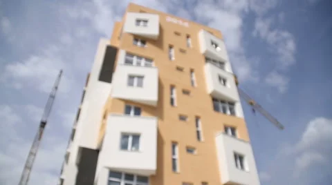 Construction. Cranes. Buidling focus pull. Video stock 53824884