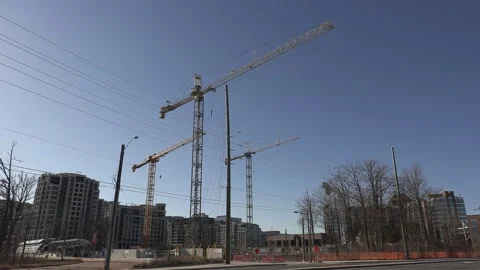 Construction cranes building new condominium apartment towers near Toronto Видео 150737182