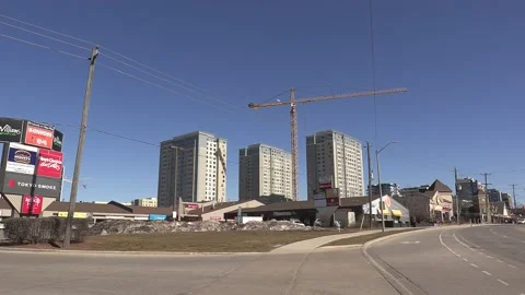 Construction cranes building new condominium apartment towers Stock Footage 150743320