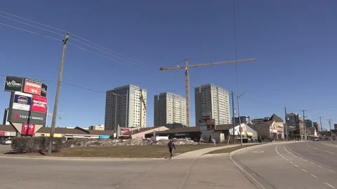 Construction cranes building new condominium apartment towers Video stock 150743343