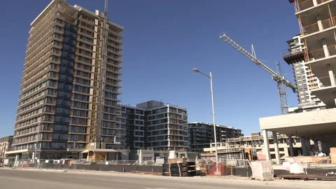 Construction cranes building new condominium apartment towers near Toronto Stockbeeldmateriaal 150748956