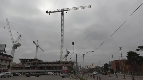 Construction cranes building new condominium development near Toronto Stock Footage 151187372